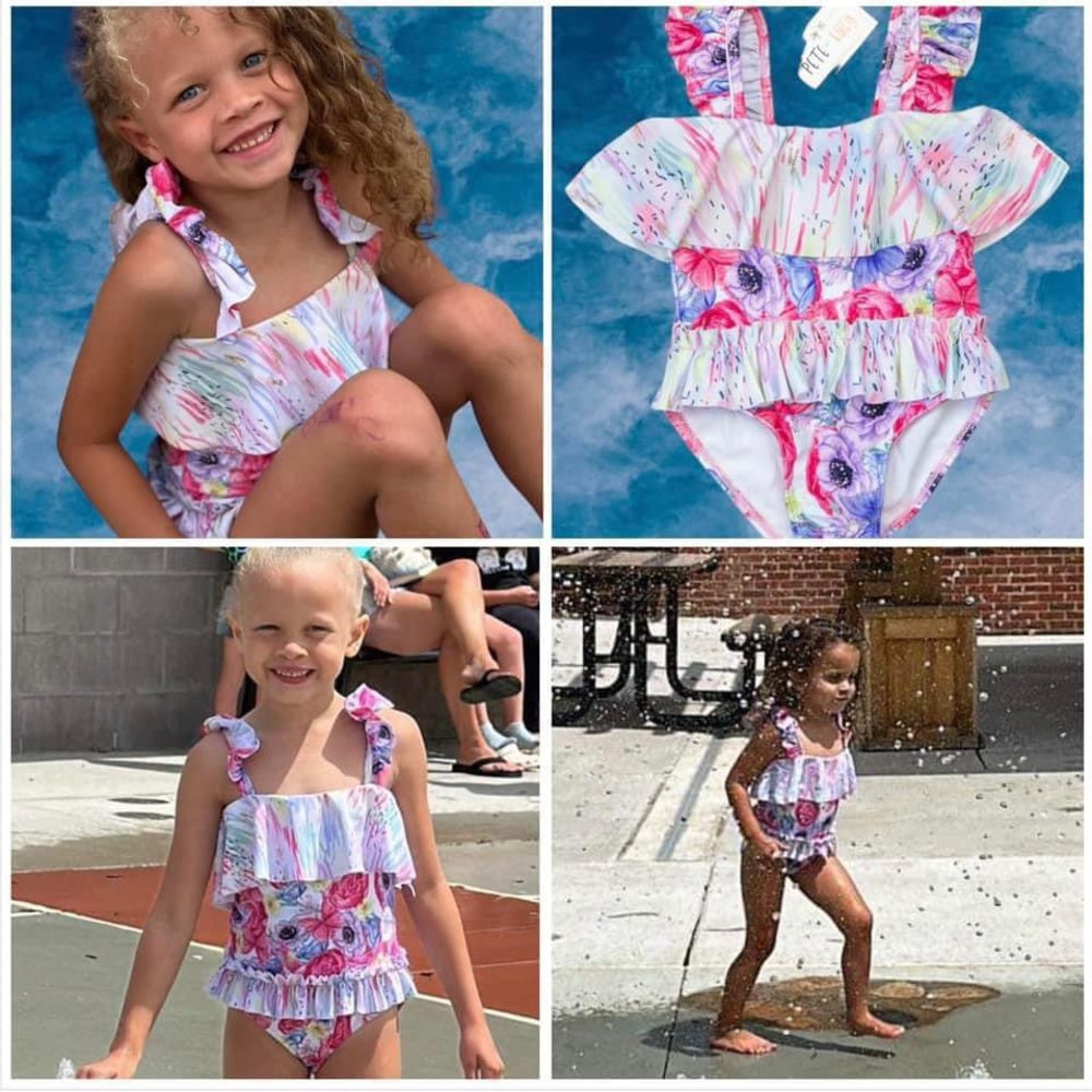 NWOT. Coming Up Roses Swim Suit